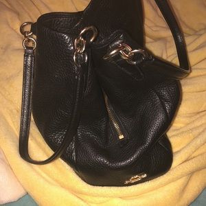Authentic Coach handbag…Very unique three deep pockets